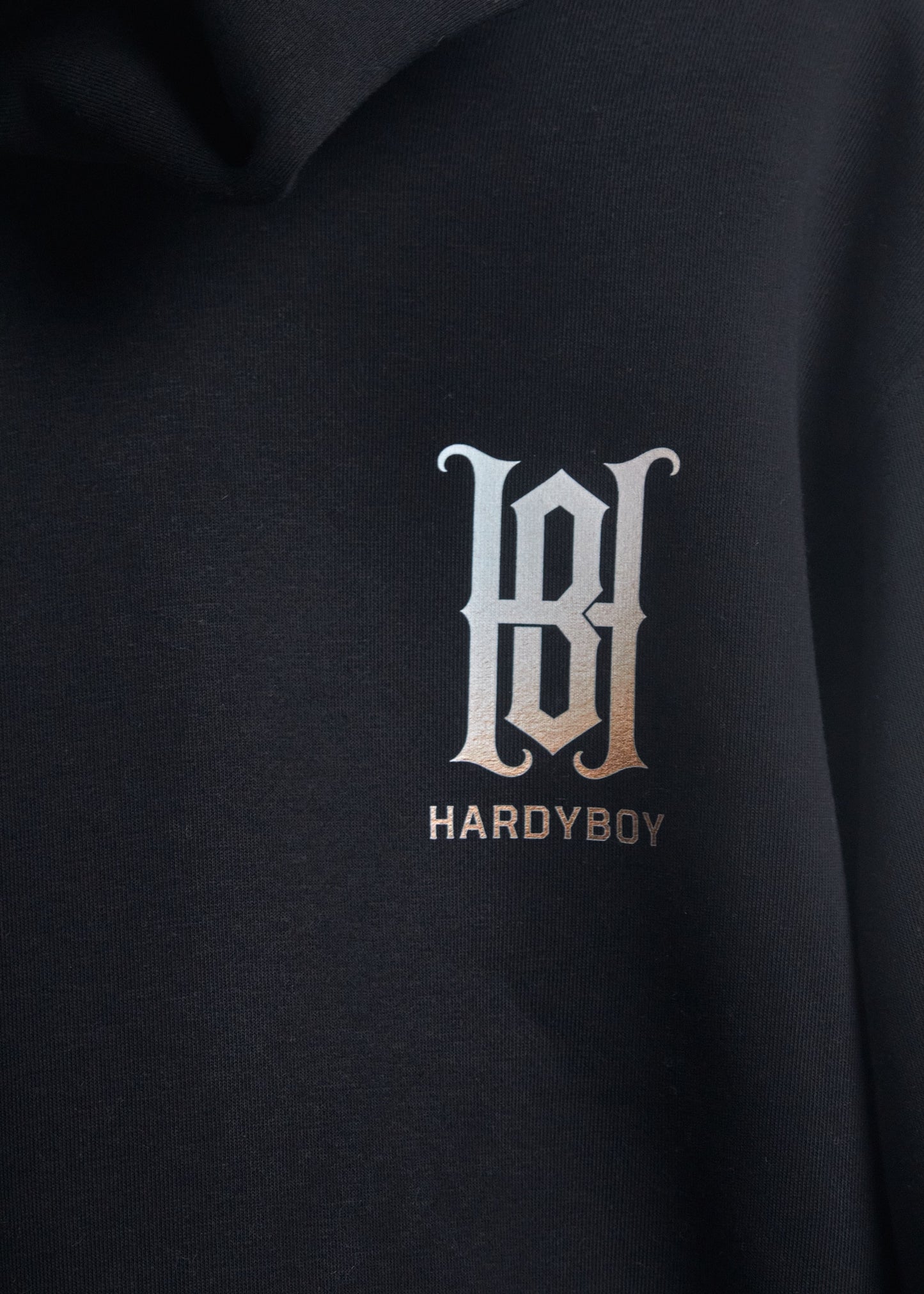 Black hoodie with Hardyboy monologo on left chest